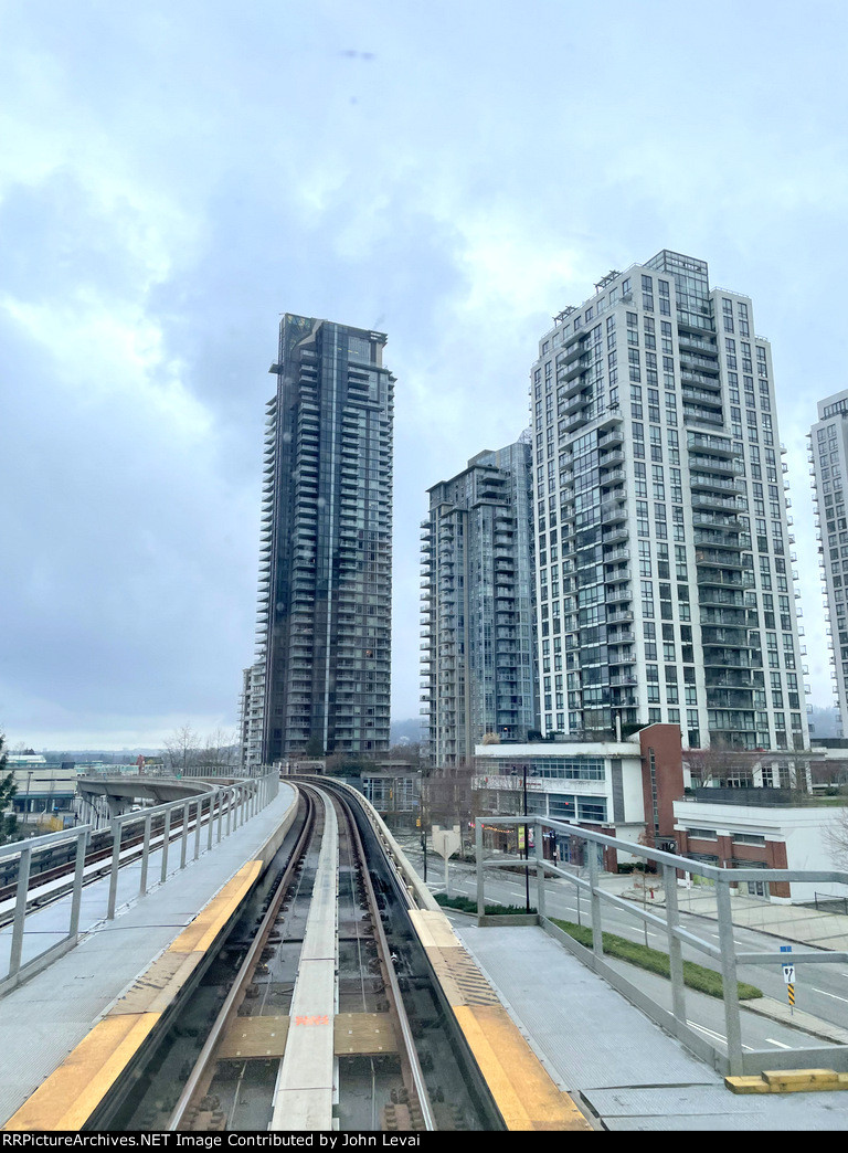 Passing through Coquitlam after departing Lafarge Lake-Douglas Station